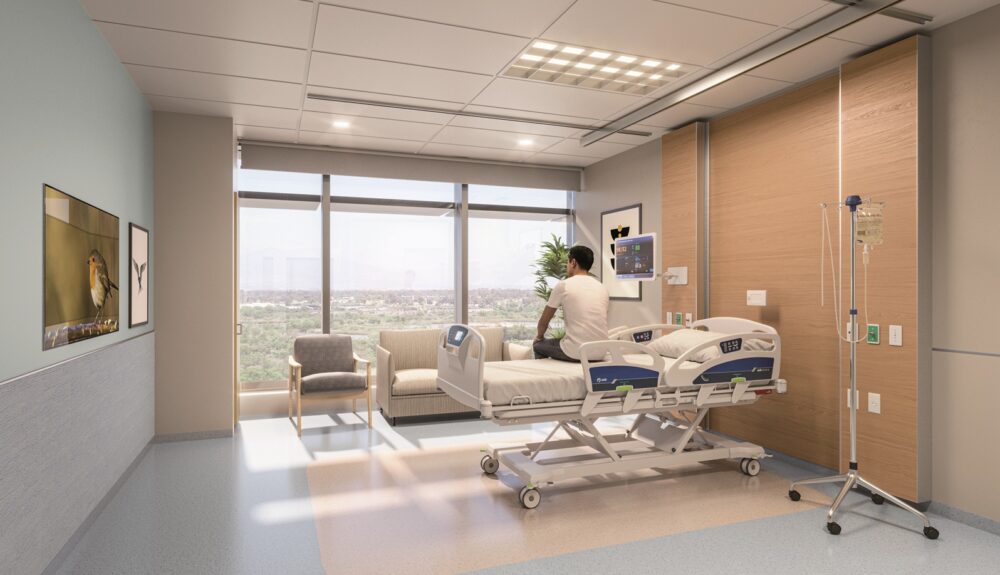 Flexible design extends to patient rooms. Variable air-exchange rates allow each room to be licensed as either ICU or standard, so patients don’t need to be moved when their conditions change. © CO Architects
