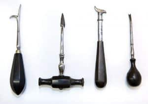 Examples of early elevators. The fourth image is a Goat's foot elevator with ebony handle (Reproduction by courtesy of the British Dental Association)