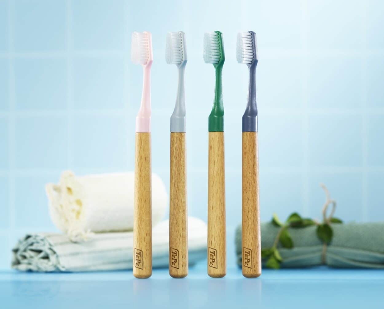 TePe's products include dental floss made from recycled water bottles—with a container and outer packaging made from recycled materials—and a toothbrush with a reusable handle. (Credit: TePe)