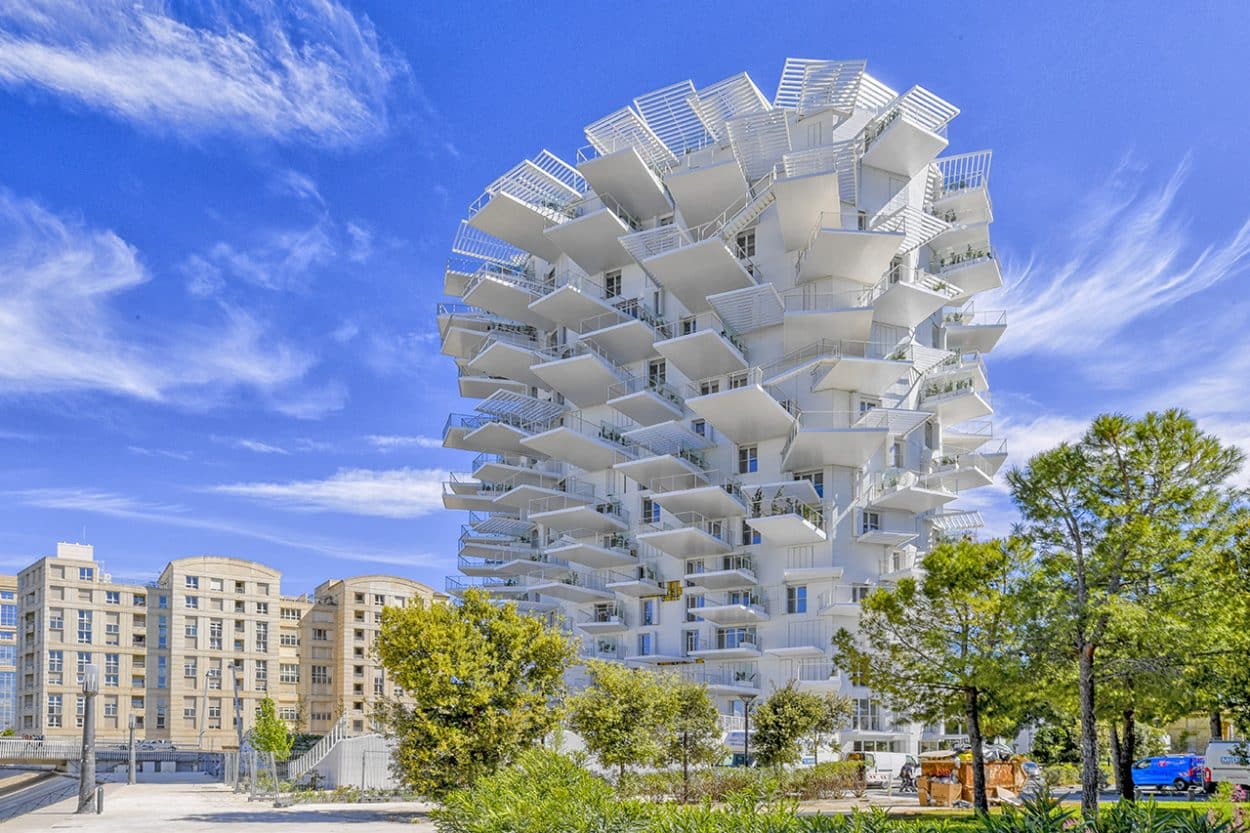 Modelled on the shape of a tree, the Arbre Blanc tower in Montpellier is a curved 17-story building containing 113 apartments. (Credit: SFA-NLA-OXO)